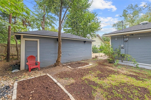 garage with fence