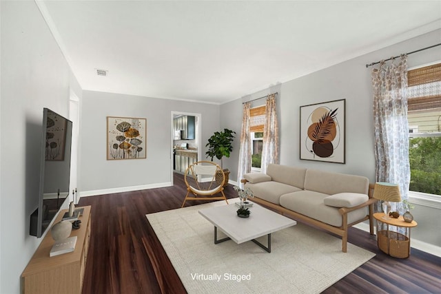 1906 Paige St, Georgetown, TX 78626 - living room with dark wood-type flooring and baseboards