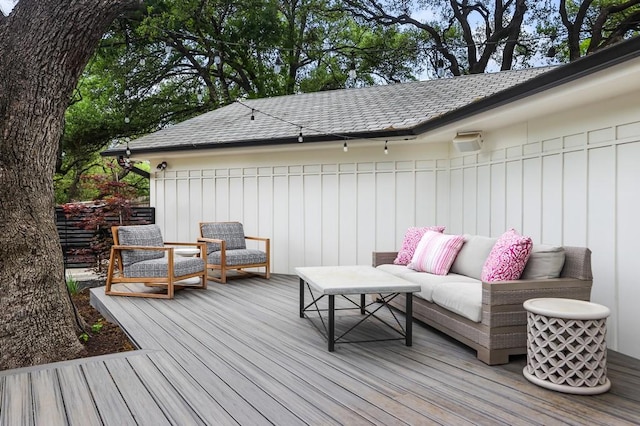 wooden deck with outdoor lounge area