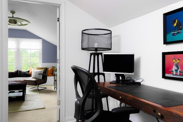 office space featuring carpet floors, lofted ceiling, and ceiling fan