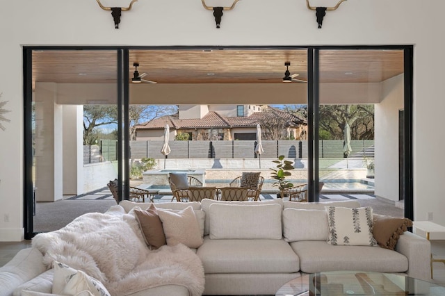 living room featuring a ceiling fan