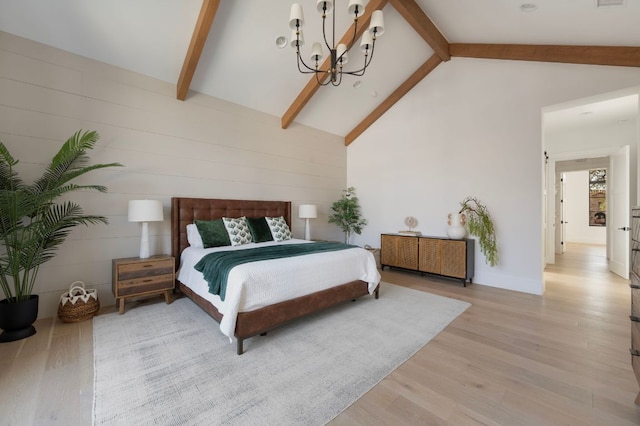 200 Birdstone Ln, Georgetown, TX 78628 - bedroom with beam ceiling, light wood-style floors, a chandelier, and high vaulted ceiling