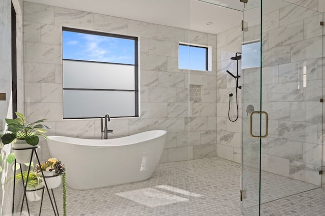 200 Birdstone Ln, Georgetown, TX 78628 - bathroom with a stall shower and a freestanding bath