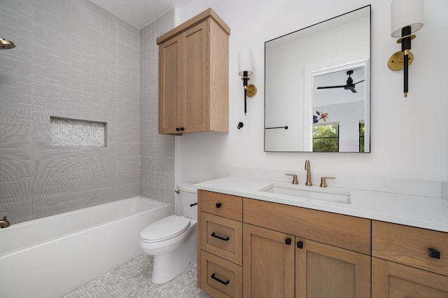 bathroom featuring toilet, shower / bathtub combination, tile patterned floors, and vanity