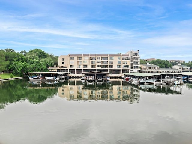 property view of water featuring a boat dock