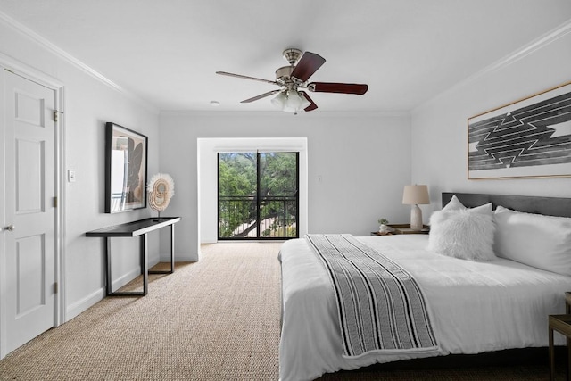 carpeted bedroom with a ceiling fan, crown molding, and baseboards