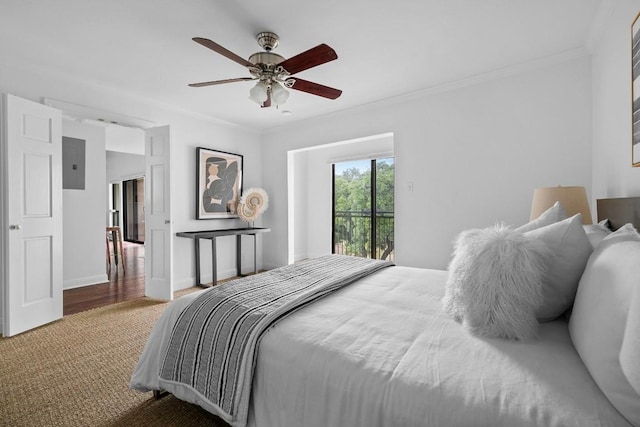 carpeted bedroom featuring crown molding, a ceiling fan, access to outside, electric panel, and baseboards