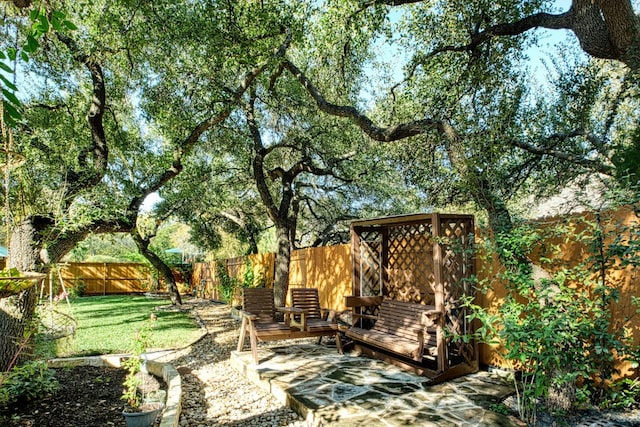 view of yard with a fenced backyard