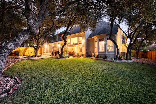 view of yard with a fenced backyard and a patio