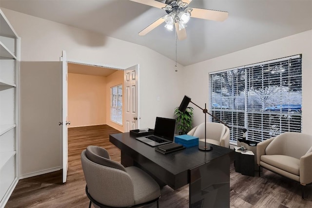 office space with lofted ceiling, wood finished floors, and a ceiling fan