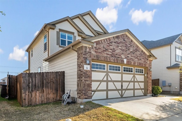 view of property exterior with a garage, concrete driveway, brick siding, and fence