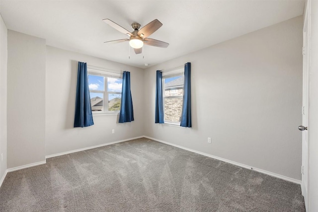 2950 E Old Settlers Blvd Unit 55, Round Rock, TX 78665 - carpeted spare room featuring a ceiling fan and baseboards