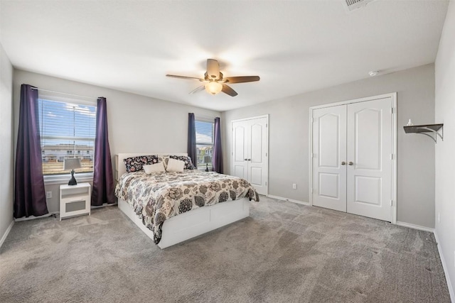 2950 E Old Settlers Blvd Unit 55, Round Rock, TX 78665 - bedroom with multiple closets, carpet flooring, and ceiling fan
