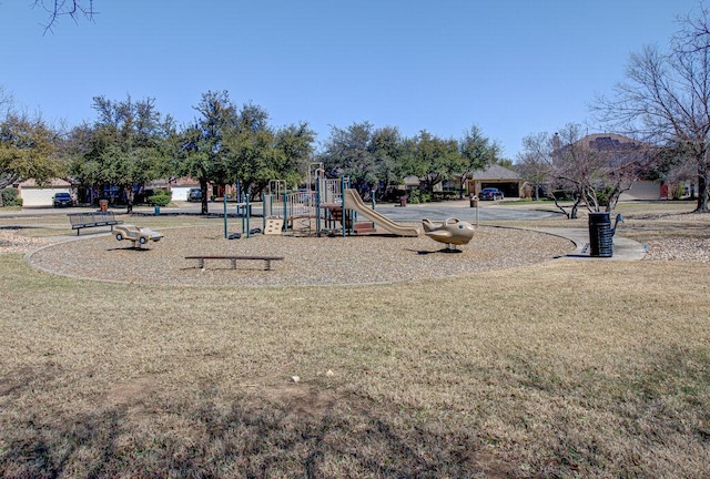 community play area with a yard