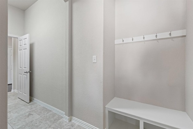 mudroom featuring baseboards