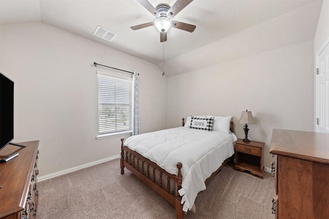 bedroom featuring visible vents, baseboards, ceiling fan, carpet, and vaulted ceiling