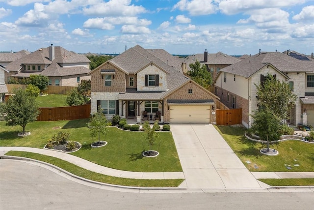 view of front facade with brick siding, concrete driveway, a front yard, fence, and a residential view