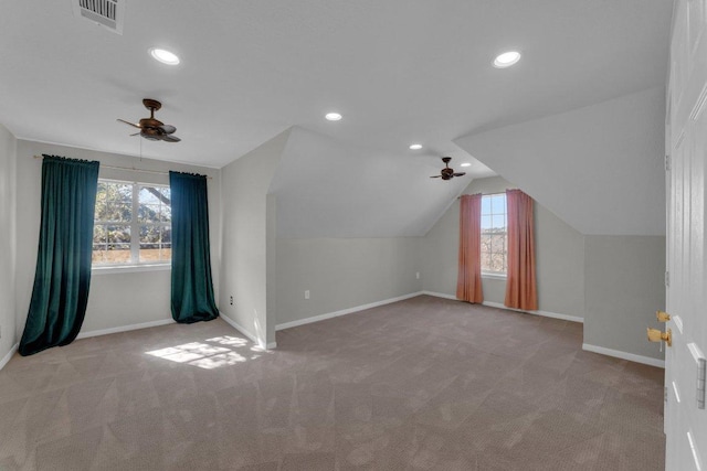 bonus room with carpet, visible vents, ceiling fan, and baseboards