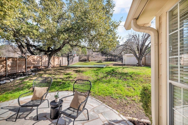 view of yard with a patio area and a fenced backyard