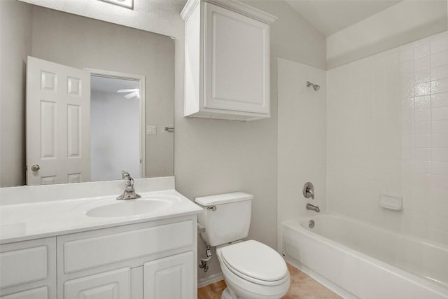 bathroom featuring vanity, toilet, and shower / bathtub combination