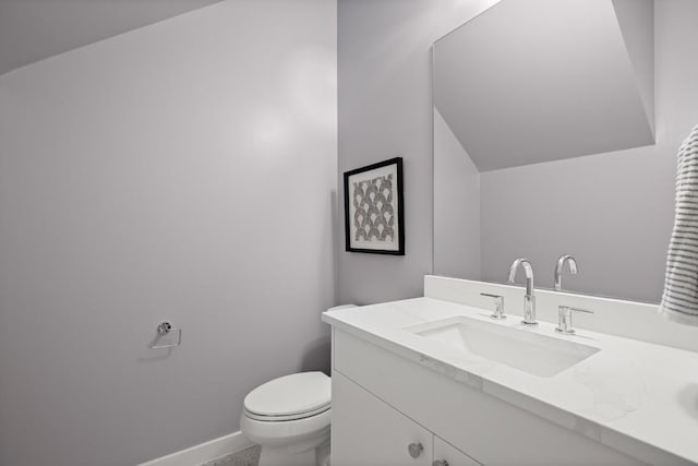 3402 Goodwin Ave Unit 1, Austin, TX 78702 - half bath featuring baseboards, toilet, and vanity