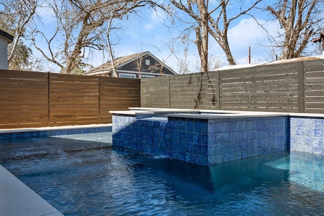 3402 Goodwin Ave Unit 1, Austin, TX 78702 - view of swimming pool featuring a fenced backyard and a pool with connected hot tub