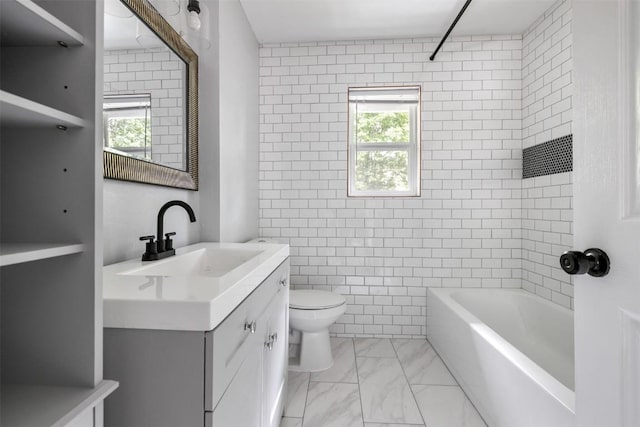 full bathroom with bathing tub / shower combination, toilet, marble finish floor, vanity, and tile walls