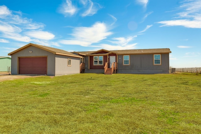 view of front of house with driveway and a front yard