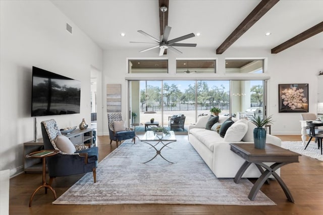 living room with a healthy amount of sunlight and wood finished floors