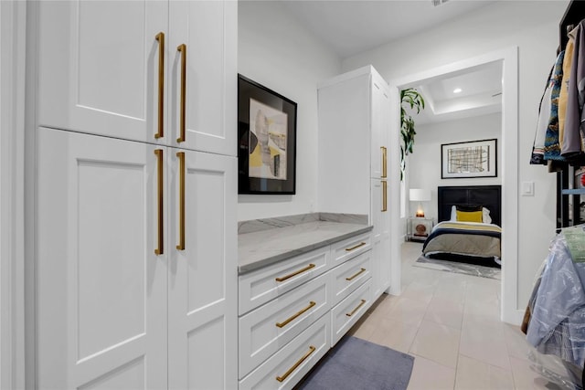 711 Twin Sails, Horseshoe Bay, TX 78657 - bedroom with a raised ceiling and recessed lighting