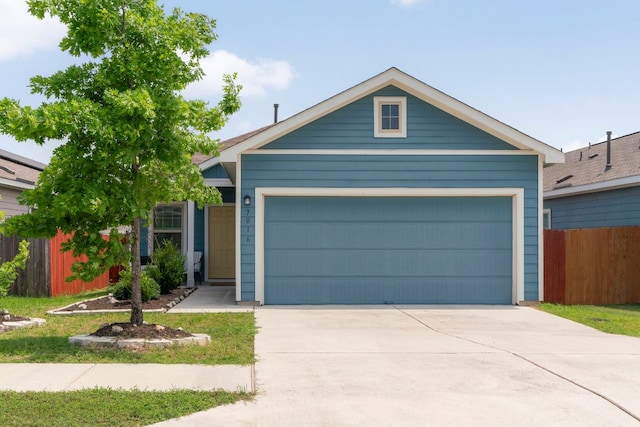 7016 Spirit Hill Rd, Austin, TX 78744 - single story home with concrete driveway and a garage
