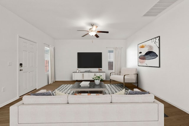 7016 Spirit Hill Rd, Austin, TX 78744 - living area with a ceiling fan and wood finished floors