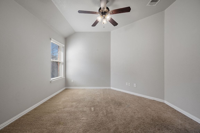 empty room with a ceiling fan, baseboards, visible vents, and carpet flooring