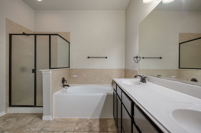 full bathroom with a garden tub, double vanity, a stall shower, and a sink