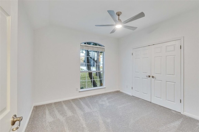 2916 Chisholm Trl, Austin, TX 78734 - unfurnished bedroom with carpet floors, baseboards, a closet, a ceiling fan, and vaulted ceiling