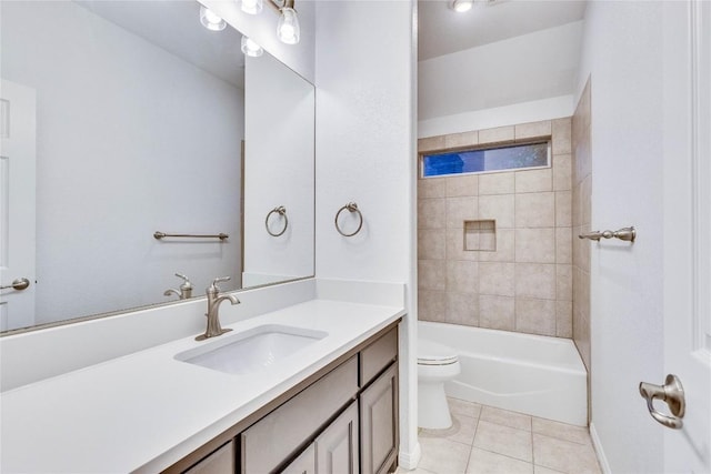 bathroom featuring shower / bathing tub combination, vanity, toilet, and tile patterned floors