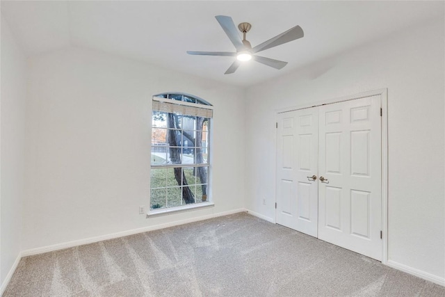 2916 Chisholm Trl, Austin, TX 78734 - unfurnished bedroom with carpet, baseboards, a closet, a ceiling fan, and vaulted ceiling