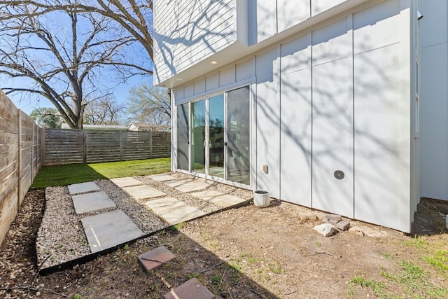 exterior space with a fenced backyard