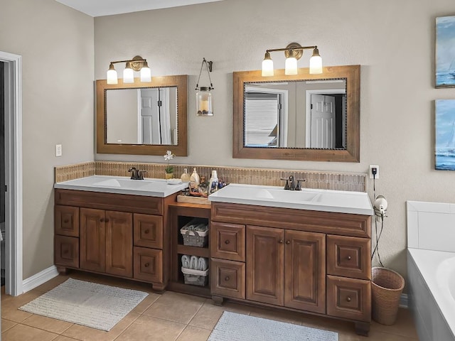 full bath featuring a garden tub, double vanity, and a sink