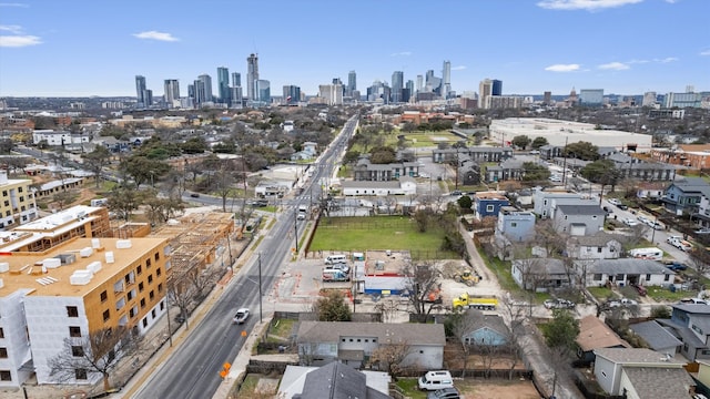 birds eye view of property featuring a view of city