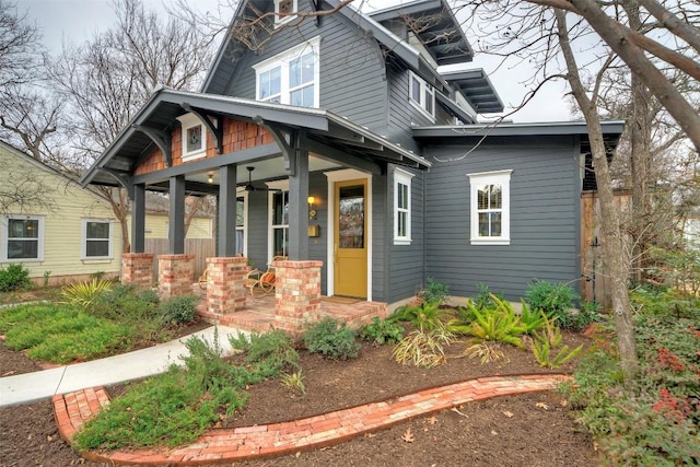 view of front facade with a porch and ceiling fan