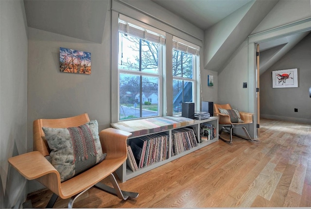 sitting room featuring light wood-style floors and baseboards