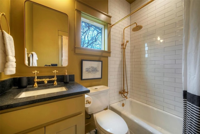 bathroom with vanity, toilet, and shower / bathtub combination with curtain