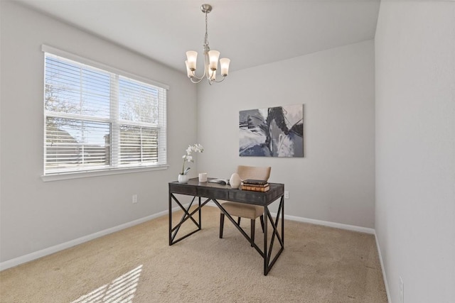 home office with an inviting chandelier, carpet, and baseboards