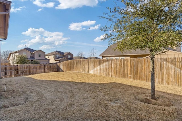 view of yard featuring a fenced backyard