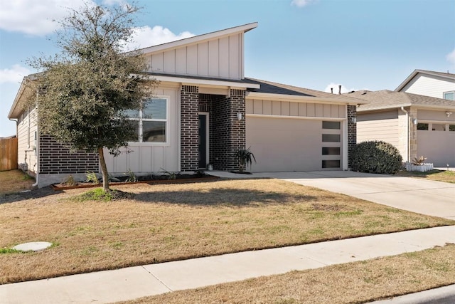 mid-century inspired home featuring brick siding, concrete driveway, an attached garage, board and batten siding, and a front yard