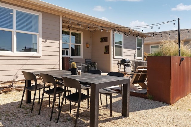 view of patio featuring outdoor dining area