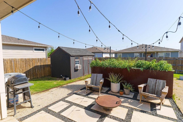 4709 Oxgang Dr, Pflugerville, TX 78660 - view of patio / terrace with an outbuilding, a shed, cooling unit, a fenced backyard, and grilling area