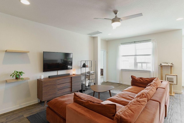 4709 Oxgang Dr, Pflugerville, TX 78660 - living area featuring wood finished floors, baseboards, and visible vents