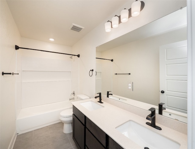 full bath featuring toilet, a sink, and visible vents